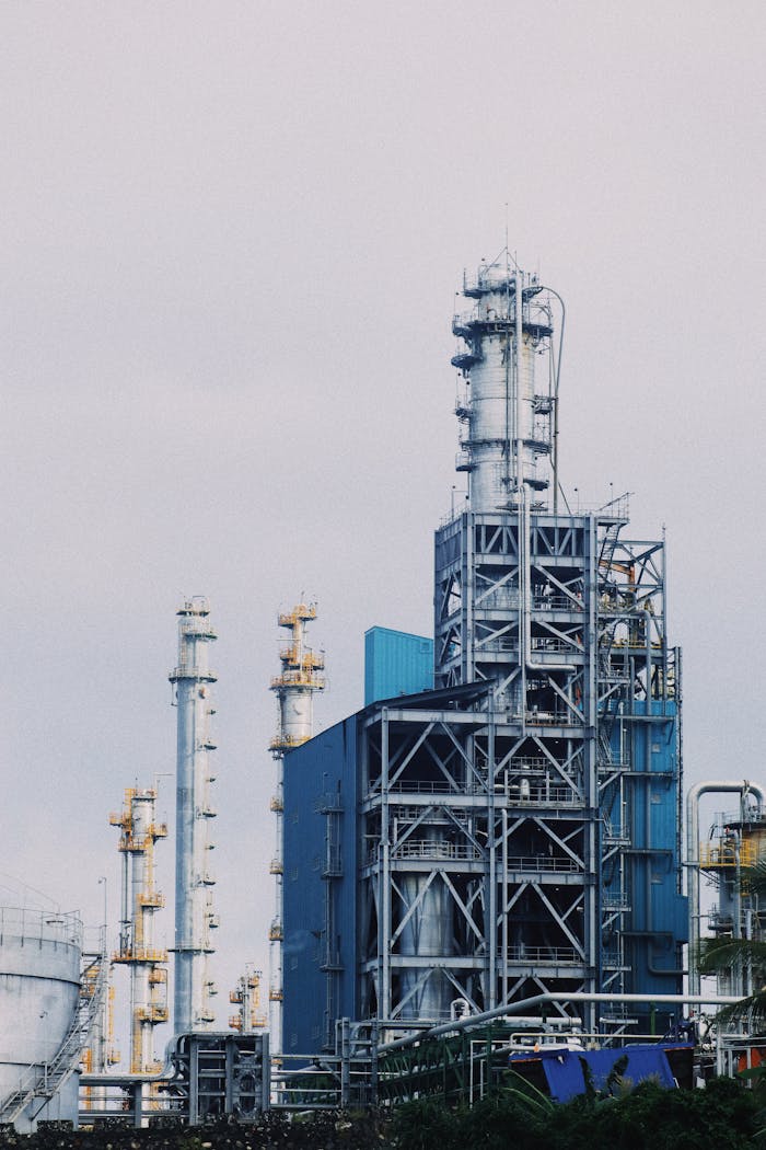 Crafting Captivating Headlines: Your awesome post title goes here A large industrial plant with towering smokestacks set against a cloudy sky, illustrating industry and production.